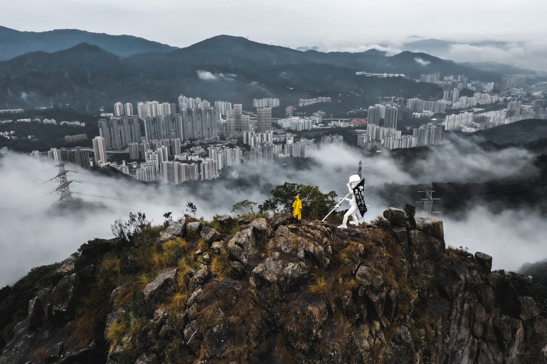 Lady Liberty HK Ascends Lion Rock